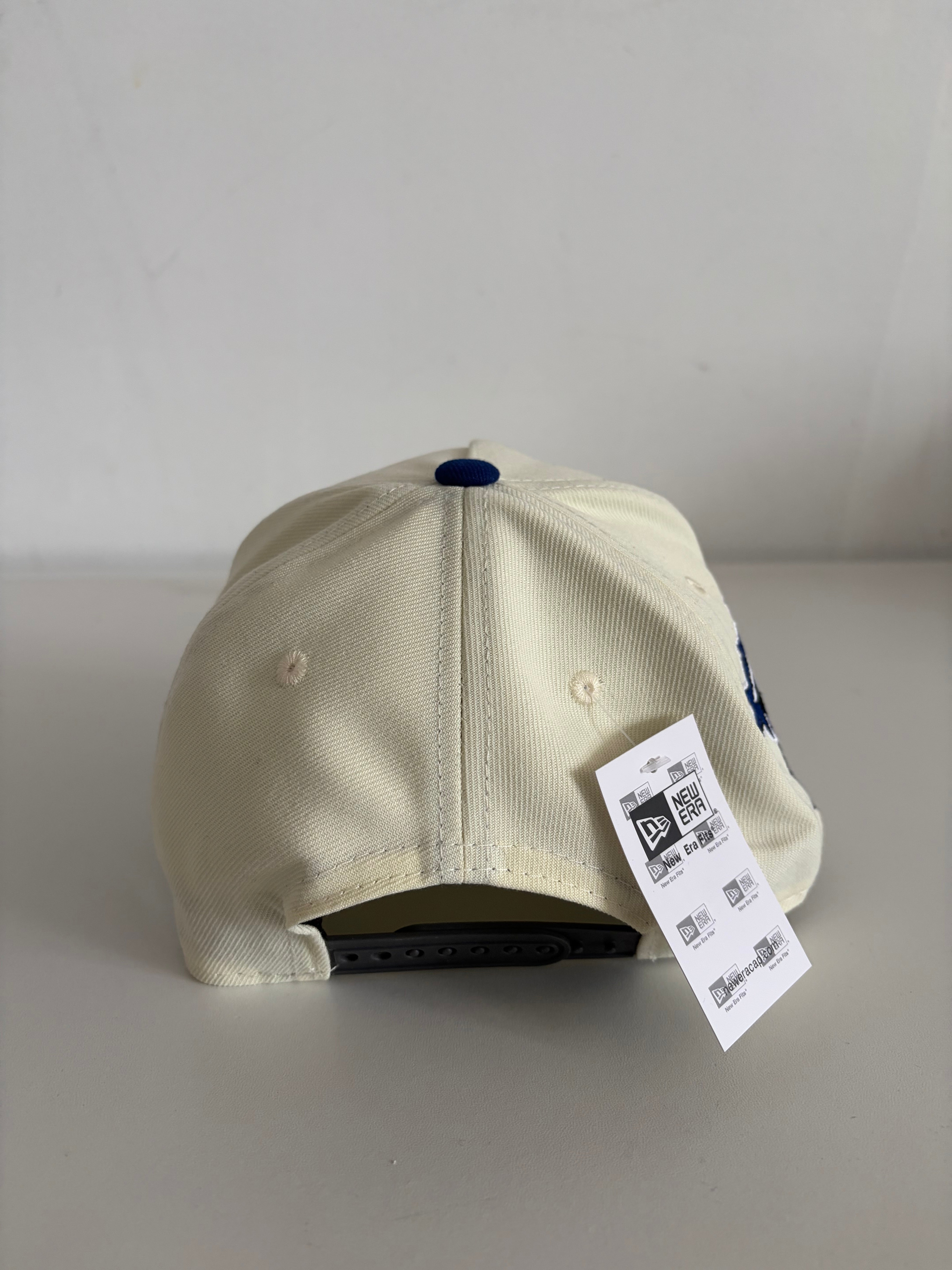 New Era Atlanta Braves 9FORTY cap in cream and charcoal, back view