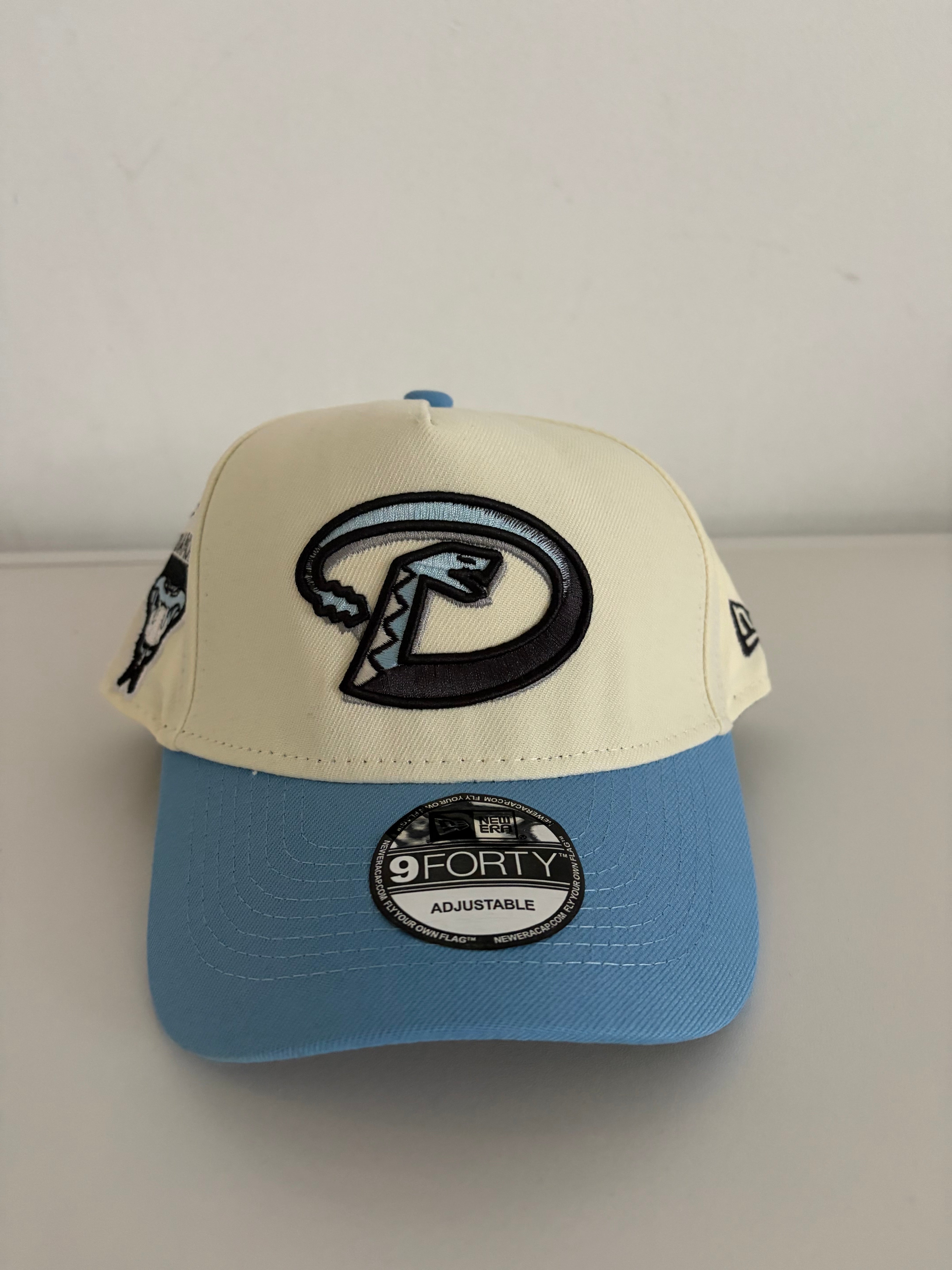 New Era Arizona Diamondbacks 9FORTY Adjustable Cap – Cream/Light Blue w/ Retro “D” Logo & Snake Patch